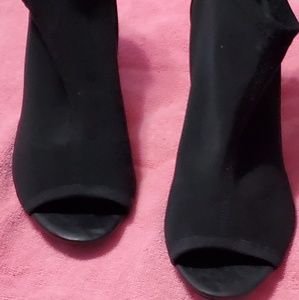 Black open-toe booties w/ back zipper.